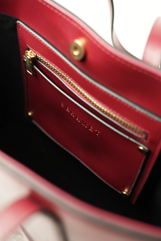 The entire tote bag in maroon